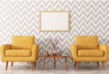 Mustard colour chairs with zigzag walpaper background